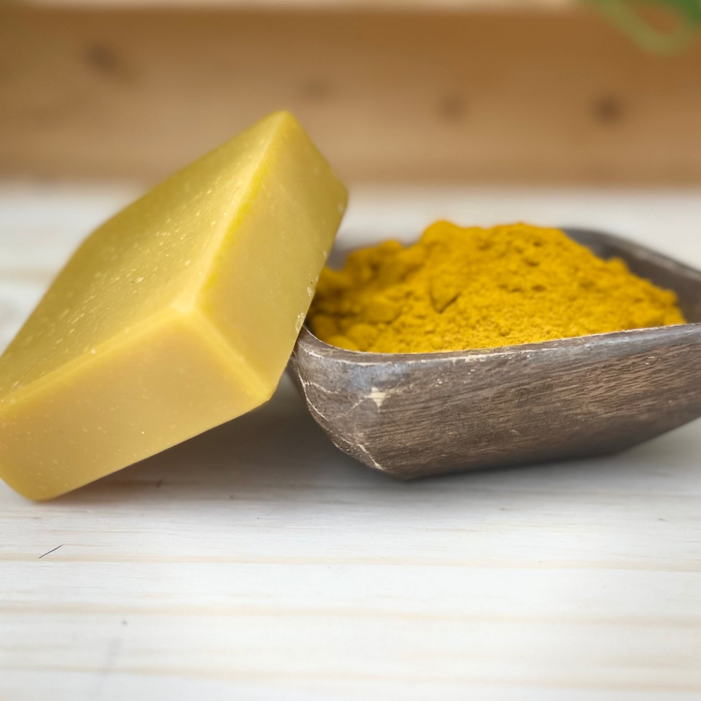 Handcrafted carrot and turmeric soap bar with olive oil and shea butter by Body Atom botanical skincare